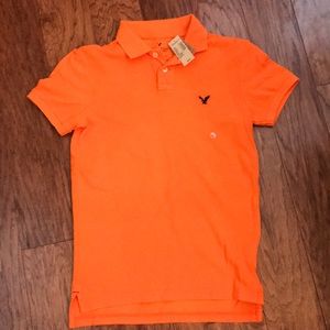 American Eagle orange polo.  New with tags.
